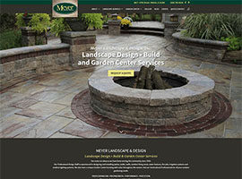 home page view with patio and stone fireplace