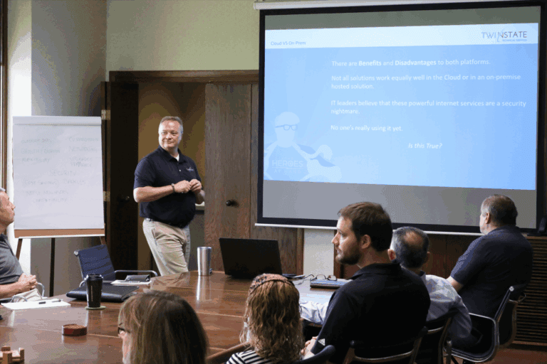 Professional IT consulting presentation at Twin State Technical Services conference on cloud computing solutions.
