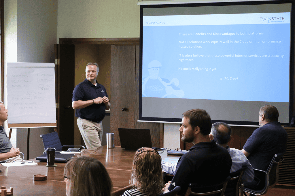 Professional IT consulting presentation at Twin State Technical Services conference on cloud computing solutions.