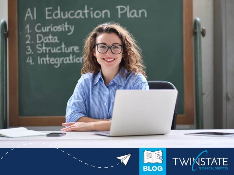 Female teacher in classroom with laptop, discussing AI education plan focusing on curiosity, data, structure, and integration for innovative learning.